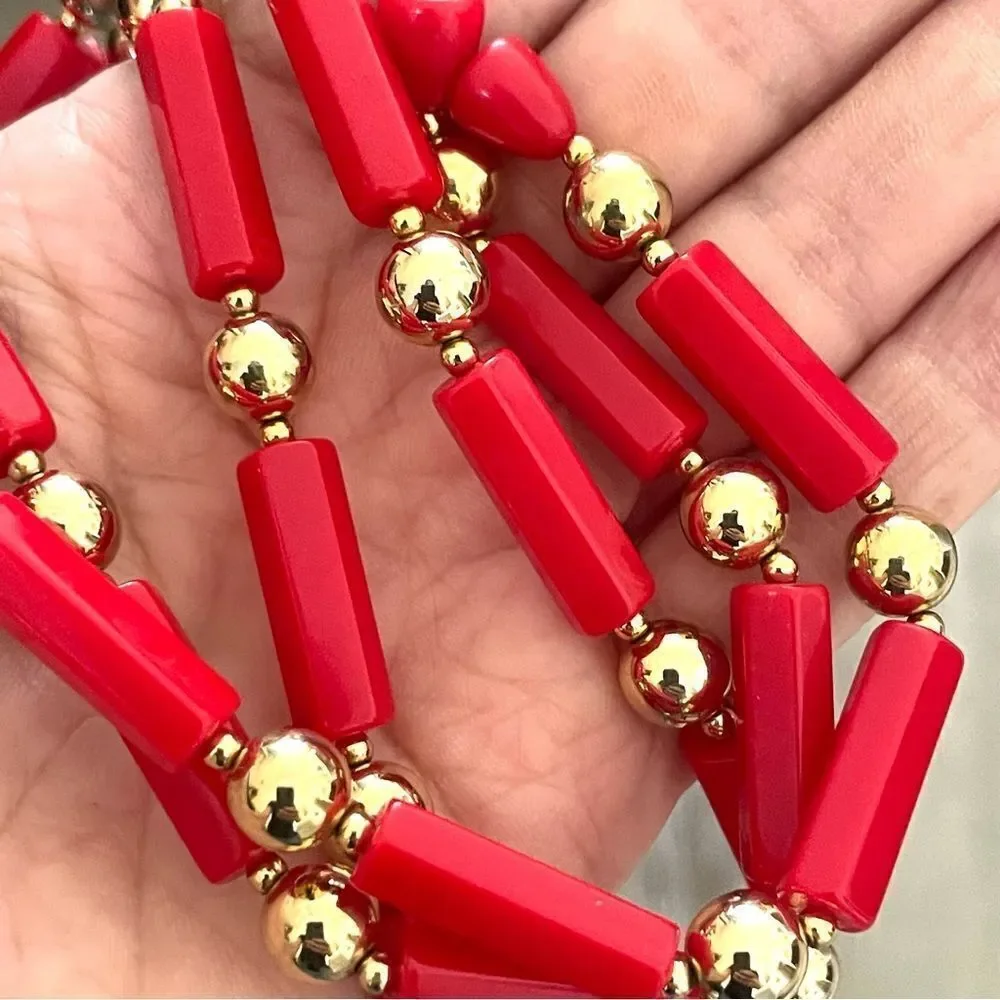 Red and gold tone beaded necklace